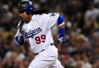 LOS ANGELES, CA - AUGUST 18: Manny Ramirez #99  of the Los Angeles Dodgers  runs to second plate aginst the St. Louis Cardinals at Dodger Stadium on August 18, 2009 in Los Angeles, California.  (Photo by Jacob de Golish/Getty Images)