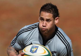 CENTURION, SOUTH AFRICA - JULY 23: Luke McAlister  of the All Blacks runs with the ball during a New Zealand All Blacks training session at Zwartkop School on July 23, 2009 in Centurion, South Africa.  (Photo by David Rogers/Getty Images)