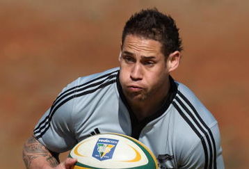 CENTURION, SOUTH AFRICA - JULY 23: Luke McAlister  of the All Blacks runs with the ball during a New Zealand All Blacks training session at Zwartkop School on July 23, 2009 in Centurion, South Africa.  (Photo by David Rogers/Getty Images)