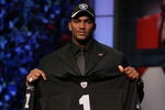 NEW YORK - APRIL 28:  JaMarcus Russell poses with his Oakland Raiders jersey after being chosen first overall by the Oakland Raiders at the 2007 NFL Draft at Radio City Music Hall April 28, 2007 in New York City.  (Photo by Nick Laham/Getty Images)