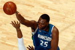 NEW ORLEANS - FEBRUARY 08:  Al Jefferson #25 of the Minnesota Timberwolves makes a shot over David West #30 of the New Orleans Hornets on February 8, 2009 in New Orleans, Louisiana.  The Hornets defeated the Timberwolves 101-97.  NOTE TO USER: User expressly acknowledges and agrees that, by downloading and/or using this Photograph, user is consenting to the terms and conditions of the Getty Images License Agreement.  (Photo by Chris Graythen/Getty Images)