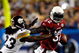 TAMPA, FL - FEBRUARY 01:  Edgerrin James #32 of the Arizona Cardinals runs the ball against Tyrone Carter #23 of the Pittsburgh Steelers during Super Bowl XLIII on February 1, 2009 at Raymond James Stadium in Tampa, Florida. Steelers won 27-23. (Photo by Chris Graythen/Getty Images)