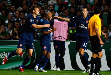 GLASGOW, SCOTLAND - AUGUST 18: Thomas Vermaelen, Abou Diaby and Robin van Persie of Arsenal celebrate the second goal during the UEFA Champions League qualifying match between Celtic and Arsenal at Celtic Park on August 18, 2009 in Glasgow, Scotland.  (Photo by Jeff J Mitchell/Getty Images)
