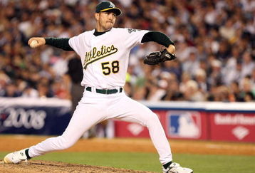 NEW YORK - JULY 15:  American League All-Star Justin Duchscherer #58 of the Oakland A's pitches during the 79th MLB All-Star Game at Yankee Stadium on July 15, 2008 in the Bronx borough of New York City.  (Photo by Nick Laham/Getty Images)