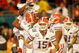 MIAMI - JANUARY 08:  Quarterback Tim Tebow #15 of the Florida Gators runs to the sideline as his team celebrates scoring a touchdown against the Oklahoma Sooners in the FedEx BCS National Championship Game at Dolphin Stadium on January 8, 2009 in Miami, Florida.  (Photo by Eliot J. Schechter/Getty Images)
