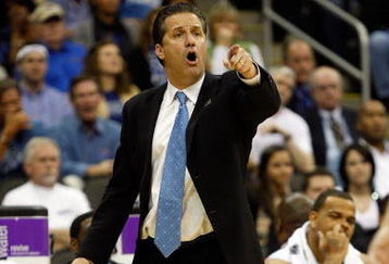 KANSAS CITY, MO - MARCH 21:  Head Coach John Calipari of the Memphis Tigers points a finger from the sideline during their second round game against the Maryland Terrapins in the NCAA Division I Men's Basketball Tournament at the Sprint Center on March 21, 2009 in Kansas City, Missouri. The Tigers defeated the Terrapins 89-70.  (Photo by Jamie Squire/Getty Images)