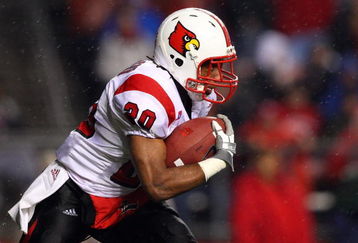 PISCATAWAY, NJ - DECEMBER 04: Victor Anderson #20 of the Louisville Cardinals runs the ball against the Rutgers Scarlet Knights at Rutgers Stadium on December 4, 2008 in Piscataway, New Jersey.  (Photo by Jim McIsaac/Getty Images)