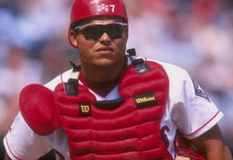 18 Jun 1998:  Ivan Rodriguez #7 of the Texas Rangers looks on during a game against the Oakland Athletics at The Ballpark in Arlington, Texas. The Rangers defeated the Athletics 3-2. Mandatory Credit: Stephen Dunn  /Allsport