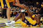 LOS ANGELES, CA - OCTOBER 28:  Kobe Bryant #24 of the Los Angeles Lakers is helped up by teammate Pau Gasol #16 in the third quarter against the Portland Trail Blazers on October 28, 2008 at Staples Center in Los Angeles, California. NOTE TO USER: User expressly acknowledges and agrees that, by downloading and/or using this Photograph, user is consenting to the terms and conditions of the Getty Images License Agreement.  (Photo by Harry How/Getty Images)