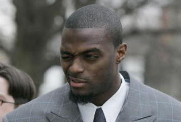 LEBANON - JANUARY 14: New York Giants wide receiver Plaxico Burress winks at a supporter as he arrives at the Lebanon County Courthouse January 14, 2009 in Lebanon, Pa.  Burress is scheduled to appear in a civil trial in a dispute with an automobile dealer over what he owes in damages to a vehicle supplied to him by the dealership. (Photo by Chris Gardner/Getty Images)