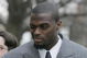 LEBANON - JANUARY 14: New York Giants wide receiver Plaxico Burress winks at a supporter as he arrives at the Lebanon County Courthouse January 14, 2009 in Lebanon, Pa. Burress is scheduled to appear in a civil trial in a dispute with an automobile dealer over what he owes in damages to a vehicle supplied to him by the dealership. (Photo by Chris Gardner/Getty Images)