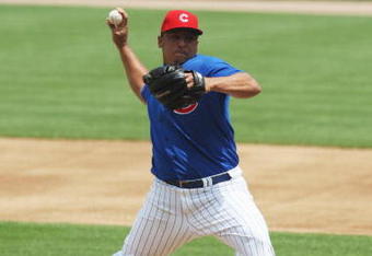 CHICAGO - JULY 03:  Carlos Zambrano  #38 of the Chicago Cubs throws a pitch against the Milwaukee Brewers during their MLB game on July 3, 2009 at Wrigley Field in Chicago, Illinois. (Photo by Jonathan Daniel/Getty Images) 
