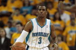 NEW ORLEANS - APRIL 25:  Chris Paul #3 of the New Orleans Hornets drives the ball up court during Game Three of the Western Conference Quarterfinals against the Denver Nuggets during the 2009 NBA Playoffs at New Orleans Arena on April 25, 2009 in New Orleans, Louisiana. The Hornets won 95-93.  NOTE TO USER: User expressly acknowledges and agrees that, by downloading and or using this photograph, User is consenting to the terms and conditions of the Getty Images License Agreement.  (Photo by Bob Levey/Getty Images)