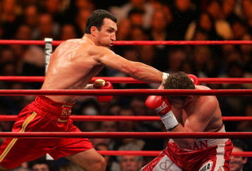 NEW YORK - FEBRUARY 23:  Wladimir Klitschko (L) of Ukraine throws a right to the head of Sultan Ibragimov (R) of Russia during their WBO and IBF/IBO Unification Heavyweight World Championship bout on February 23, 2008 at Madison Square Garden in New York City.  (Photo by Chris Trotman/Getty Images)