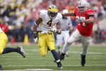COLUMBUS, OH - NOVEMBER 22: Brandon Minor #4 of the Michigan Wolverines carries the ball against Lawrence Wilson #87 of the Ohio State Buckeyes during the Big Ten Conference game at Ohio Stadium on November 22, 2008 in Columbus, Ohio.  (Photo by Andy Lyons/Getty Images)
