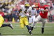 COLUMBUS, OH - NOVEMBER 22: Brandon Minor #4 of the Michigan Wolverines carries the ball against Lawrence Wilson #87 of the Ohio State Buckeyes during the Big Ten Conference game at Ohio Stadium on November 22, 2008 in Columbus, Ohio.  (Photo by Andy Lyons/Getty Images)