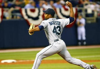 MINNEAPOLIS, MN - APRIL 6:  Miguel Batista #43 of the Seattle Mariners is pitches against the Minnesota Twins at the Metrodome on April 6, 2009 in Minneapolis, Minnesota. (Photo by Scott A. Schneider/Getty Images)