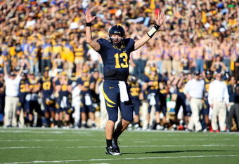 BERKELEY, CA - NOVEMBER 22:  Kevin Riley #13 of the California Golden Bears signals for a touchdown against the Stanford Cardinal during an NCAA football game on November 22, 2008 at Memorial Stadium in Berkeley, California.  (Photo by Jed Jacobsohn/Getty Images)