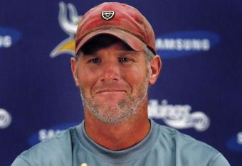 EDEN PRAIRIE, MN - AUGUST 18: Brett Favre talks with the media after his first practice with the Minnesota Vikings on August 18, 2009 at Winter Park in Eden Prairie, Minnesota.  (Photo by Scott A. Schneider/Getty Images)