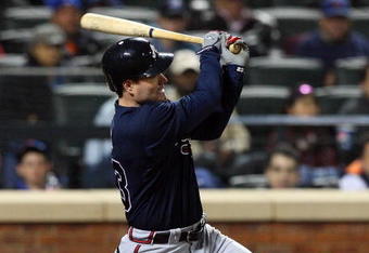 NEW YORK - MAY 11:  Matt Diaz #23 of the Atlanta Braves connects for a two run double in the seventh inning against the New York Mets on May 11, 2009 at Citi Field in the Flushing neighborhood of the Queens borough of New York City.  (Photo by Jim McIsaac/Getty Images)