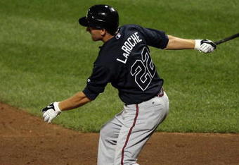 NEW YORK - AUGUST 19:  Adam LaRoche #22 of the Atlanta Braves bats against the New York Mets on August 19, 2009 at Citi Field in the Flushing neighborhood of the Queens borough of New York City.  (Photo by Jim McIsaac/Getty Images)