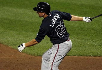 NEW YORK - AUGUST 19:  Adam LaRoche #22 of the Atlanta Braves bats against the New York Mets on August 19, 2009 at Citi Field in the Flushing neighborhood of the Queens borough of New York City.  (Photo by Jim McIsaac/Getty Images)
