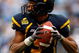 CHARLOTTE, NC - DECEMBER 27:  Jock Sanders #9 of the West Virginia Mountaineers runs with the ball against the North Carolina Tar Heels during the Meineke Car Care Bowl on December 27, 2008 at Bank of America Stadium in Charlotte, North Carolina.  (Photo by Streeter Lecka/Getty Images)