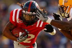BATON ROUGE, LA - NOVEMBER 22:  Dexter McCluster #22 of the Ole Miss Rebels is tackled by Kelvin Sheppard #11 of the Louisiana State University Tigers on November 22, 2008 at Tiger Stadium in Baton Rouge, Louisiana.  (Photo by Chris Graythen/Getty Images)