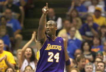 ORLANDO, FL - JUNE 14:  Kobe Bryant #24 of the Los Angeles Lakers points down the court during Game Five of the 2009 NBA Finals against the Orlando Magic on June 14, 2009 at Amway Arena in Orlando, Florida. The Lakers won 99-86. NOTE TO USER:  User expressly acknowledges and agrees that, by downloading and or using this photograph, User is consenting to the terms and conditions of the Getty Images License Agreement. (Photo by Elsa/Getty Images) 