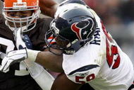 CLEVELAND - NOVEMBER 25: Jamal Lewis #31 of the Cleveland Browns tries to avoid the tackle of Demeco Ryans #59 of the Houston Texans during a second quarter run on November 25, 2007 at Cleveland Browns Stadium in Cleveland, Ohio. (Photo By Gregory Shamus/Getty Images)