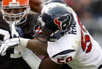 CLEVELAND - NOVEMBER 25: Jamal Lewis #31 of the Cleveland Browns tries to avoid the tackle of Demeco Ryans #59 of the Houston Texans during a second quarter run on November 25, 2007 at Cleveland Browns Stadium in Cleveland, Ohio. (Photo By Gregory Shamus/Getty Images)