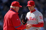 DENVER - APRIL 10:  Starting pitcher Cole Hamels #35 of the Philadelphia Phillies is removed from the game by manager Charlie Manuel #41 after 3 and 2/3 innings against the Colorado Rockies during MLB action on Opening Day at Coors Field on April 10, 2009 in Denver, Colorado. Hamels collected the loss as the Rockies defeated the Phillies 10-3.  (Photo by Doug Pensinger/Getty Images)