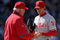 DENVER - APRIL 10:  Starting pitcher Cole Hamels #35 of the Philadelphia Phillies is removed from the game by manager Charlie Manuel #41 after 3 and 2/3 innings against the Colorado Rockies during MLB action on Opening Day at Coors Field on April 10, 2009 in Denver, Colorado. Hamels collected the loss as the Rockies defeated the Phillies 10-3.  (Photo by Doug Pensinger/Getty Images)