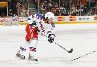 OTTAWA - SEPTEMBER 20:  Michael Del Zotto #48 of the New York Rangers follows through on his shot during a game against the Ottawa Senators on September 20, 2008 at the Scotiabank Place in Ottawa, Canada.  The Ottawa Senators defeated the New York Rangers 3-2.  (Photo by Phillip MacCallum/Getty Images)
