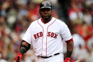 BOSTON - AUGUST 13:  David Ortiz #34 of the Boston Red Sox reacts after striking out in the ninth inning during the game against the Detroit Tigers at Fenway Park on August 13, 2009 in Boston, Massachusetts. (Photo by Elsa/Getty Images)