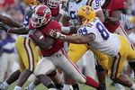 BATON ROUGE, LA - OCTOBER 25:  Knowshon Moreno #24 of Georgia outruns the tackle of Rahim Alem #84 in the second half of their football game at Tiger Stadium on October 25, 2008 in Baton Rouge, Louisiana.  Georgia won 52-38. (Photo by Dave Martin/Getty Images)