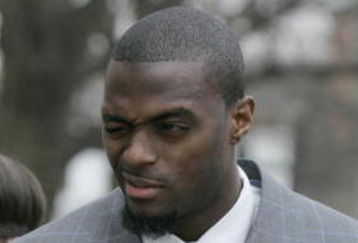 LEBANON - JANUARY 14: New York Giants wide receiver Plaxico Burress winks at a supporter as he arrives at the Lebanon County Courthouse January 14, 2009 in Lebanon, Pa.  Burress is scheduled to appear in a civil trial in a dispute with an automobile dealer over what he owes in damages to a vehicle supplied to him by the dealership. (Photo by Chris Gardner/Getty Images)