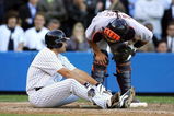 NEW YORK - OCTOBER 05:  Catcher Ivan Rodriguez #7 of the Detroit Tigers talks to Johnny Damon #18 of the New York Yankees screams after Damon was hit in the foot in the ninth inning against the Detroit Tigers in Game Two of the American League Division Series on October 5, 2006 at Yankee Stadium in the Bronx Borough of New York City.  The Tigers won the game 4-3 to tie the series at 1-1.  (Photo by Jim McIsaac/Getty Images)