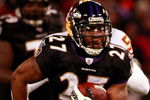 BALTIMORE - DECEMBER 07:  Running back Ray Rice #27 of the Baltimore Ravens eludes Washington runs the ball in first quarter against the Washington Redskins December 7, 2008 at M&T Bank Stadium in Baltimore, Maryland.  (Photo by Win McNamee/Getty Images)