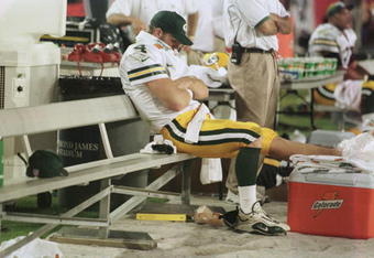 12 Nov 2000:  Brett Favre # 4 of the Green Bay Packers sits on the bench after spraining his ankle in the third quarter at Raymond James Stadium in Tampa, Florida. Mandatory Credit: Eliot Schechter/ALLSPORT