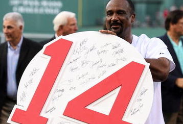 BOSTON - JULY 28:  Former Boston Red Sox outfielder Jim Rice shows off his retired number plaque during a ceremony before the Boston Red Sox game against the Oakland Athletics at Fenway Park July 28, 2009 in Boston, Massachusetts.  (Photo by Elsa/Getty Images)