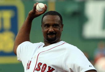 BOSTON - JULY 28:  Former Boston Red Sox outfielder Jim Rice throws out the ceremonial first pitch before the Red Sox game against the Oakland Athletics at Fenway Park July 28, 2009 in Boston, Massachusetts. Rice's number was retired in a pre-game ceremony. (Photo by Elsa/Getty Images)