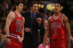 BOSTON - MAY 02:  Head coach Vinny Del Negro of the Chicago Bulls talks with Derrick Rose #1 and Kirck Hinrich #12 in the second half against the Boston Celtics in Game Seven of the Eastern Conference Quarterfinals during the 2009 NBA Playoffs at TD Banknorth Garden on May 2, 2009 in Boston, Massachusetts. The Celtics defeated the Bulls 109-99. NOTE TO USER: User expressly acknowledges and agrees that, by downloading and or using this photograph, User is consenting to the terms and conditions of the Getty Images License Agreement.  (Photo by Elsa/Getty Images)