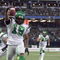 TORONTO - NOVEMBER 25: James Johnson #19 of the Saskatchewan Rough Riders jumps over a fallen Ryan Dinwiddie #4 after his interception to score a touchdown to tie the game 7-7 against the Winnipeg Blue Bombers during the second quarter of the 95th Grey Cup on November 25, 2007 at the Rogers Centre in Toronto, Ontario, Canada. Johnson would be the MVP in a 23-19 Rough Rider win. (Photo by Harry How/Getty Images)