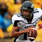 COLUMBIA, MO - SEPTEMBER 13: Quarterback Colin Kaepernick #10 of the Nevada Wolf Pack rolls out during the first half of the game against the Missouri Tigers on September 13, 2008 at Memorial Stadium in Columbia, Missouri. (Photo by Jamie Squire/Getty Images)