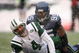 SEATTLE - DECEMBER 21: Quarterback Brett Favre #4 of the New York Jets looks up after being tackled by Lawrence Jackson #95 of the Seattle Seahawks on December 21, 2008 at Qwest Field in Seattle, Washington. The Seahawks defeated the Jets 13-3. (Photo by Otto Greule Jr/Getty Images)