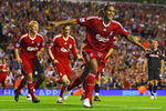 LIVERPOOL, ENGLAND - AUGUST 19:  Glen Johnson of Liverpool celebrates scoring his team's second goal during the Barclays Premier League match between Liverpool and Stoke City at Anfield on August 19, 2009 in Liverpool, England.  (Photo by Clive Brunskill/Getty Images)