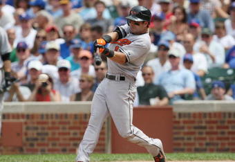 CHICAGO - JUNE 26:  Brian Roberts #1 of the Baltimore Orioles swings at a pitch against the Chicago Cubs during the MLB game on June 26, 2008 at Wrigley Field in Chicago, Illinois. (Photo by Jonathan Daniel/Getty Images) 