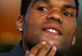 LIVERPOOL, ENGLAND - AUGUST 20:  Joleon Lescott of Everton watches from the stands during the UEFA Europa League Play off first leg match between Everton and SK Sigma Olomouc at Goodison Park on August 20, 2009 in Liverpool, England.  (Photo by Jamie McDonald/Getty Images)