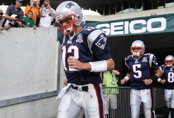 PHILADELPHIA - AUGUST 13:  Quarterback Tom Brady #12 (L), quarterback Kevin O'Connell #5 and quarterback Brian Hoyer #8 of the New England Patriots run out to the field before the preseason game against the Philadelphia Eagles August 13, 2009 at Lincoln Financial Field in Philadelphia, Pennsylvania. (Photo by Jim McIsaac/Getty Images)